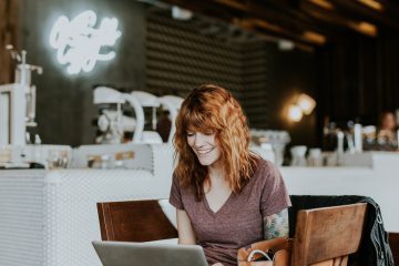 woman sitting on computer