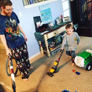 Bryan vacuuming-teaching kids about money