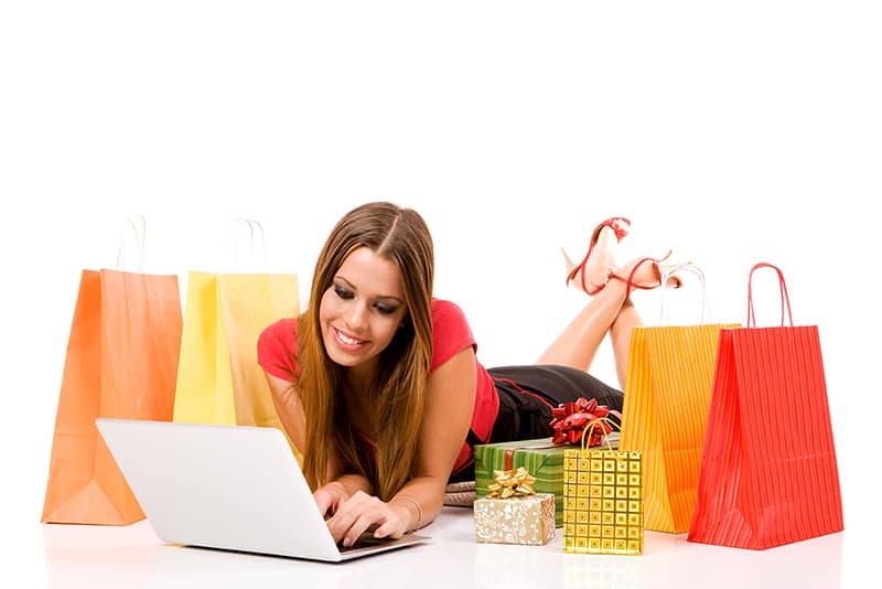 Woman shopping for gifts at a consignment store near her.