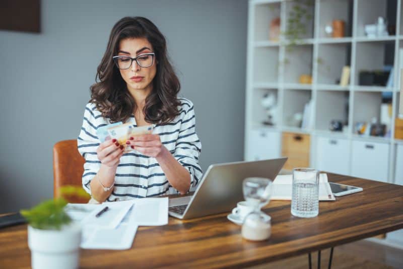 Woman paying off her debt.