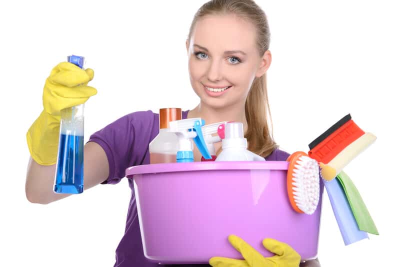 Are you ready to start a cleaning business? Like this young woman, you need supplies including brushes, buckets, spray bottles, and gloves!