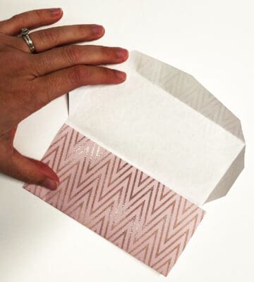 Fold the bottom flap of your cash envelope up to create a pocket. 