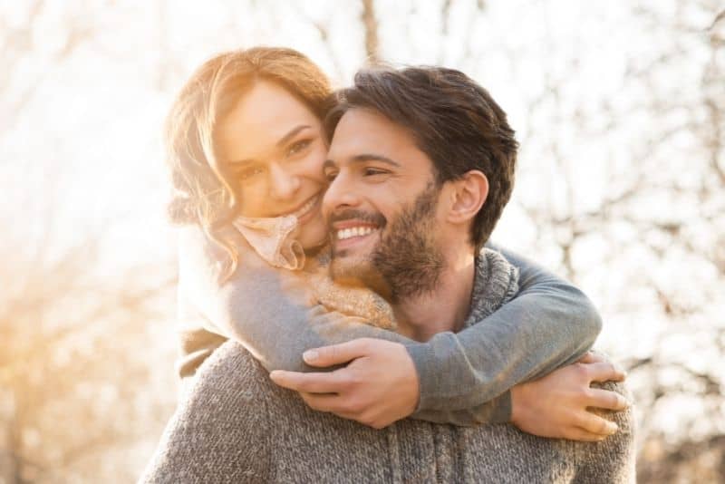 Couple embracing on a free date idea night.