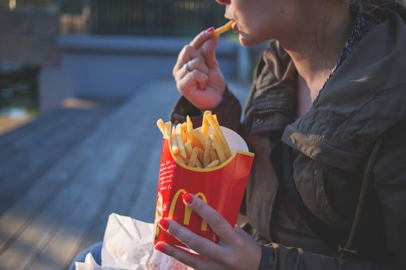 Can't stop eating handfuls of those fast-food French fries? Cravings are a sign of pregnancy. 