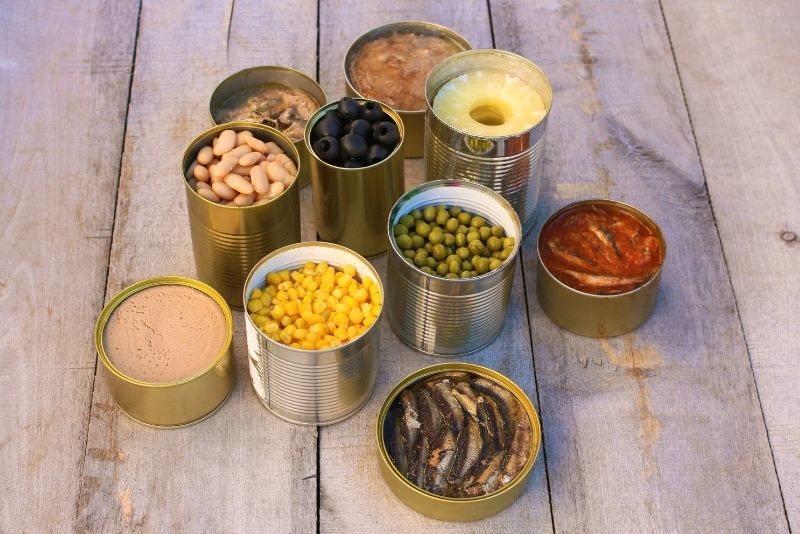 Several foods that are canned and preserved at home.