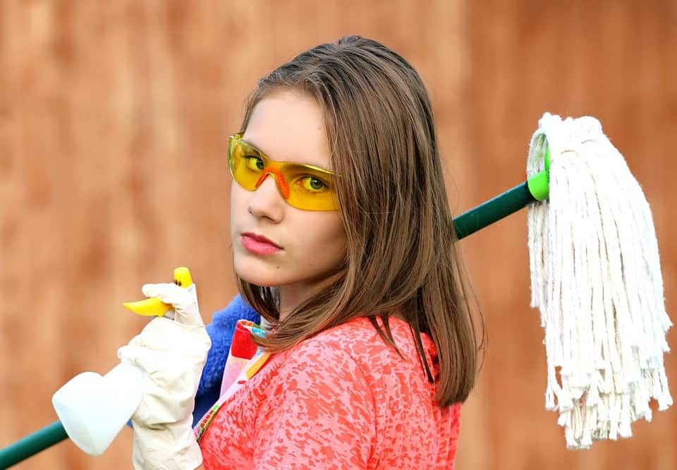 If you want to start a cleaning business like this young woman, you will need supplies like a mop, spray bottles, and even protective gloves