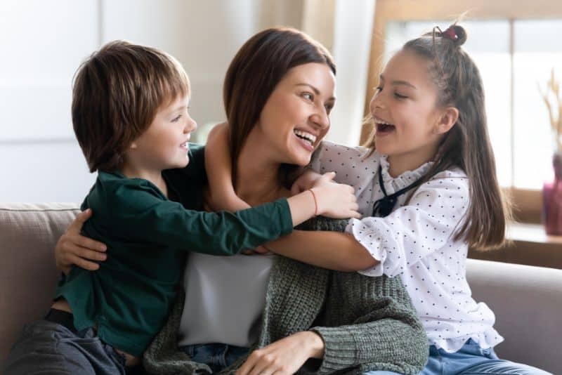 Positive mom with kids.