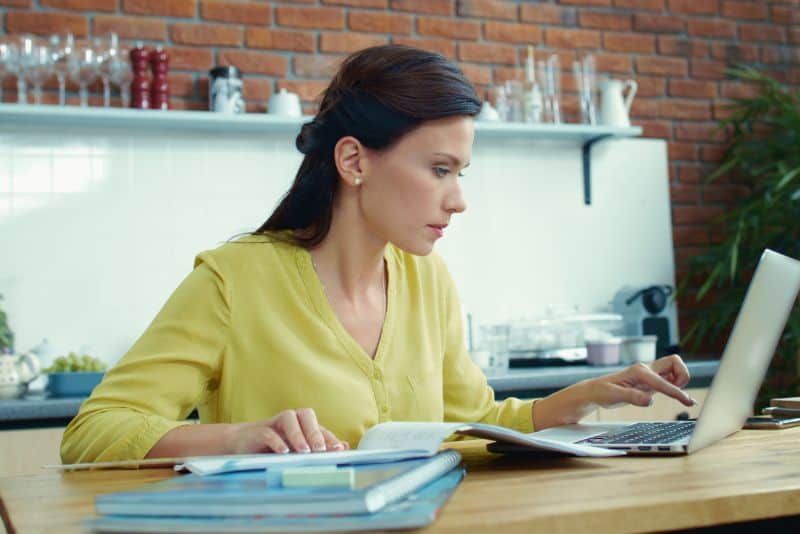 Woman on her computer checking her credit.