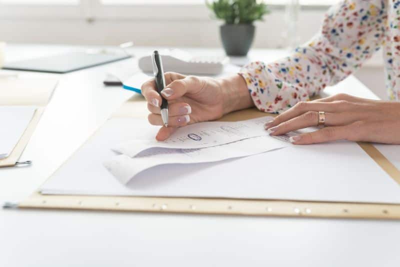 Woman looking over her finances.