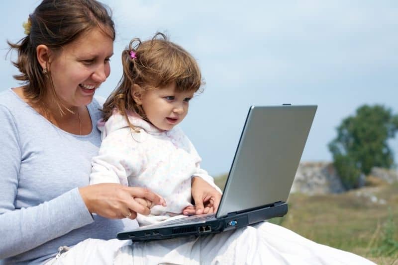 mom with child and computer