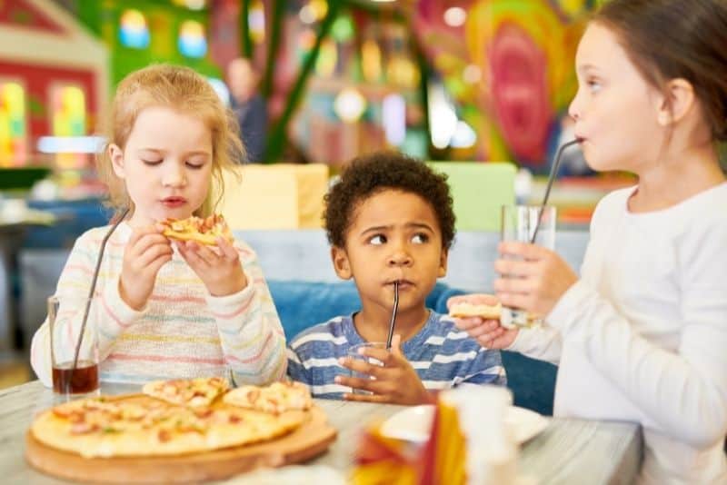 Kids eating out using the kids menu to save money.