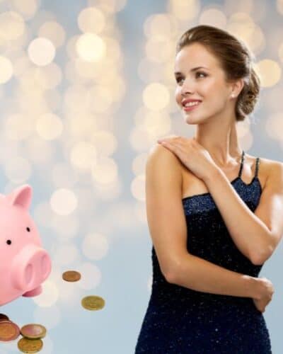 Woman with piggy bank smiling.