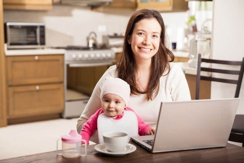 Mom with child using Refily to save on her mortage.