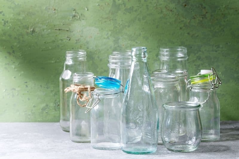empty glass bottles and jars to reuse