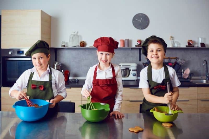 Kids cooking together.