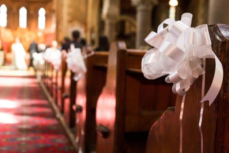 white ribbon pew bows for wedding